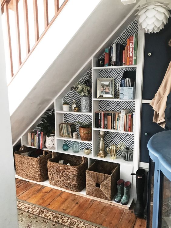 utilizing space under the stairs ideas